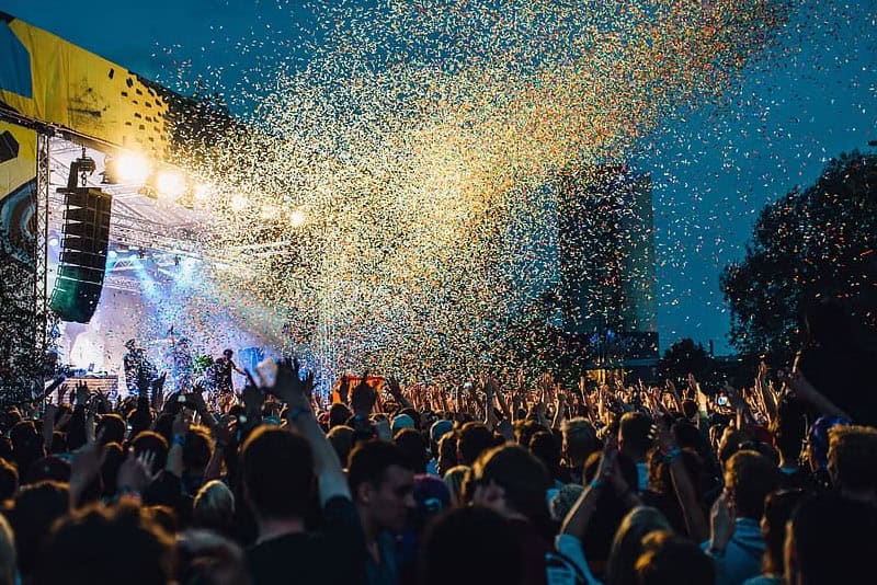 Music festival experience with crowd and stage visuals in Thailand